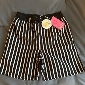 Boys Brand New Ruffle Butts Size 8 swim trunks